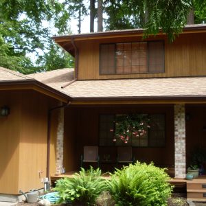 brown seamless rain gutters on PNW home